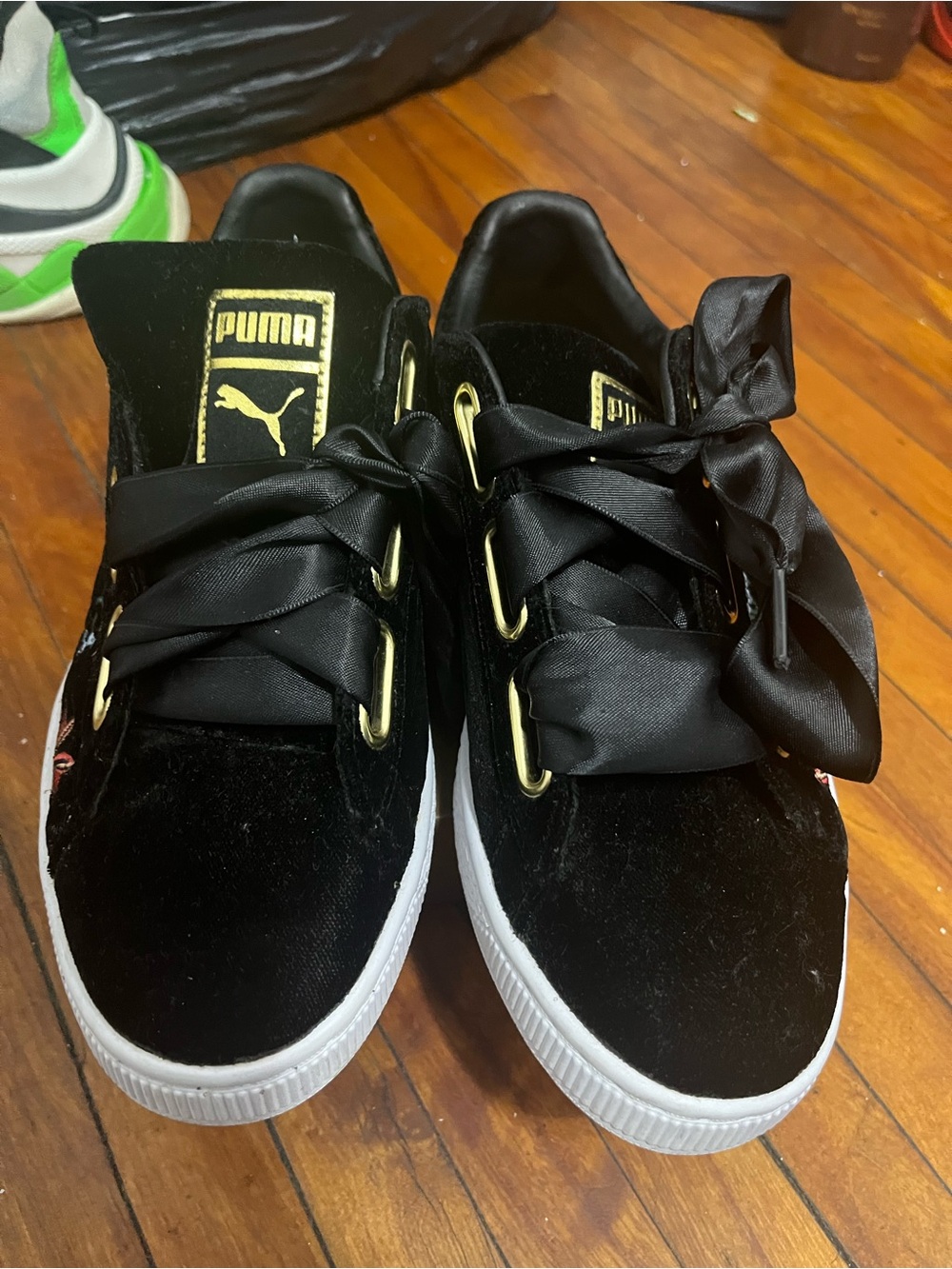 Puma Black Velvet Sneakers with Gold Accents and White Sole
